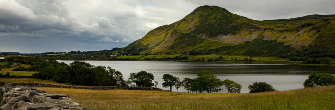 A wall and lake in the background in Yorkshire
