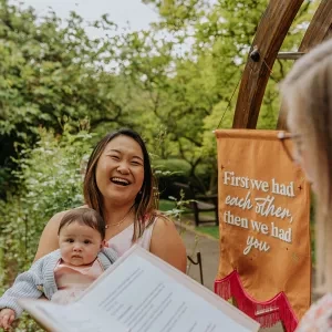 A photo of a baby naming ceremony conducted by Sam White Celebrant in the Botanical Gardens in Bath.